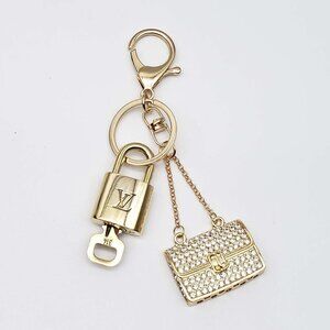 100% Auth Louis Vuitton Lock & Key with unbranded Bagcharm, Keycharm 120525